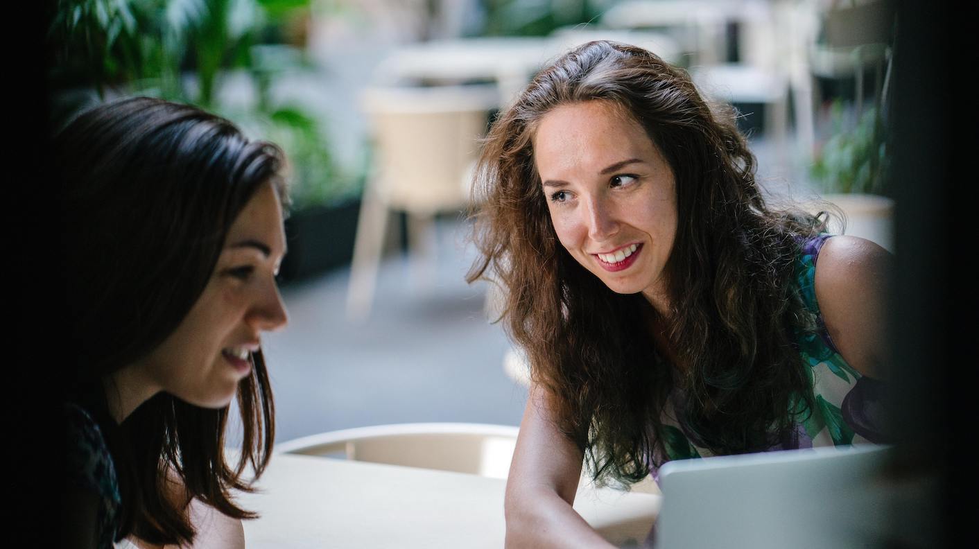 Two people discussing